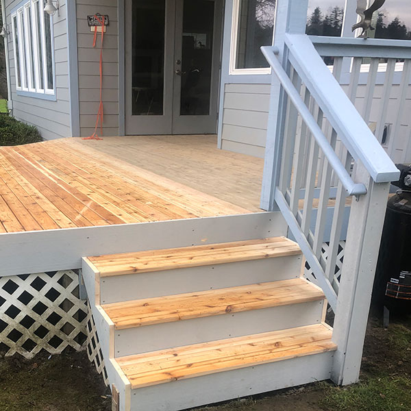 New deck and stair construction with railing