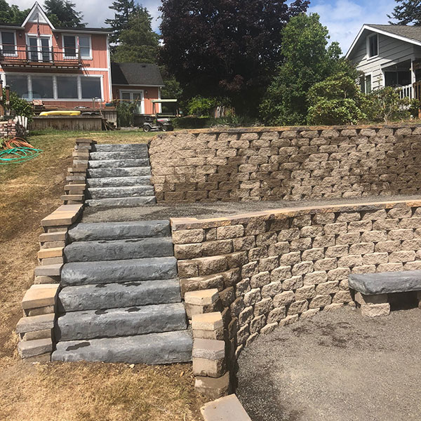 Stone steps with block retaining wall